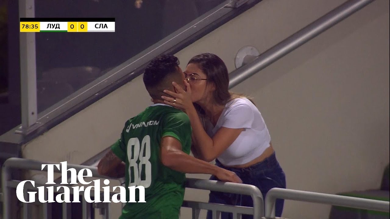 Footballer rushes to kiss wife in celebration … as goal is disallowed